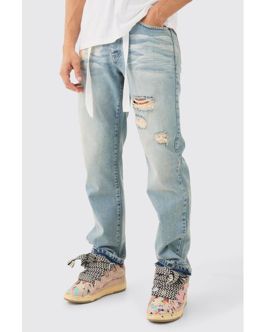 BoohooMAN Relaxed Rigid Ripped Let Down Hem Jeans With Extended Drawcords In Antique Blue for men