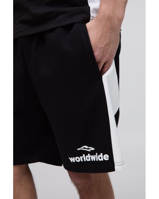 BoohooMAN Lockere mittellange Worldwide Colorblock Shorts in Black für Herren