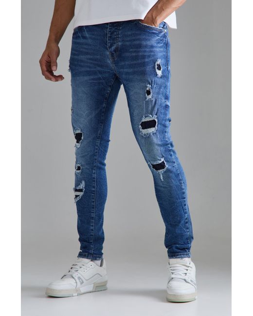 BoohooMAN Skinny Stretch Ripped Jeans In Mid Blue for Men | Lyst UK