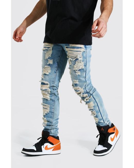 Boohoo Denim Tapered Stacked Leg Shredded Jeans in Blue Lyst