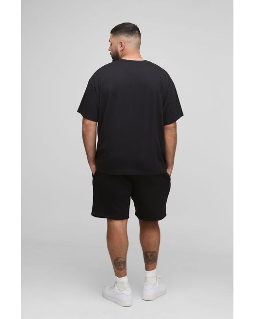 BoohooMAN Black Plus Star Puff Print Relaxed Jersey Shorts for men