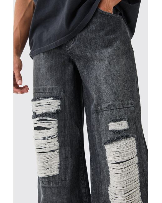 BoohooMAN Baggy Rigid Extreme Ripped Denim Jean In Washed Black for men