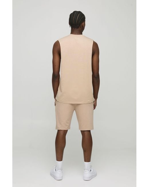 BoohooMAN Natural Lightweight Basic Slim Fit Mid Length Shorts for men
