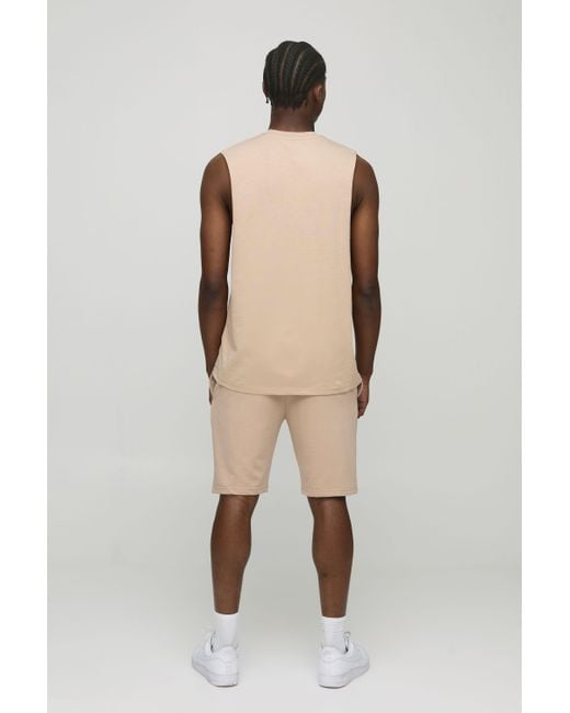 BoohooMAN Natural Lightweight Basic Slim Fit Mid Length Shorts for men
