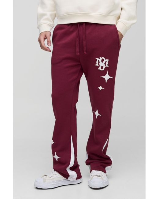 BoohooMAN Slim-Fit Jogginghose mit Stern-Applikation in Red für Herren