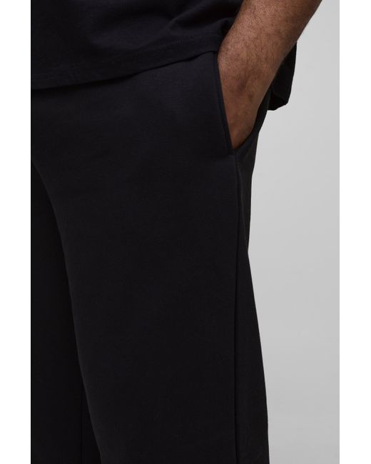 BoohooMAN Plus lockere Basic Jogginghose aus REEL Baumwolle in Black für Herren