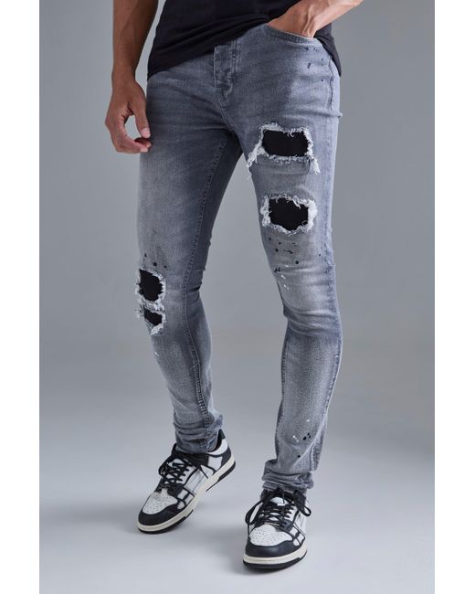 BoohooMAN Blue Super Skinny Stretched Stacked Rip & Repair Jean In Mid Grey for men