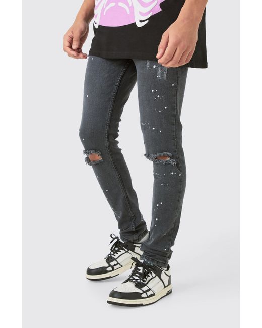 BoohooMAN Black Skinny Stretch Paint Splatter Ripped Jeans for men