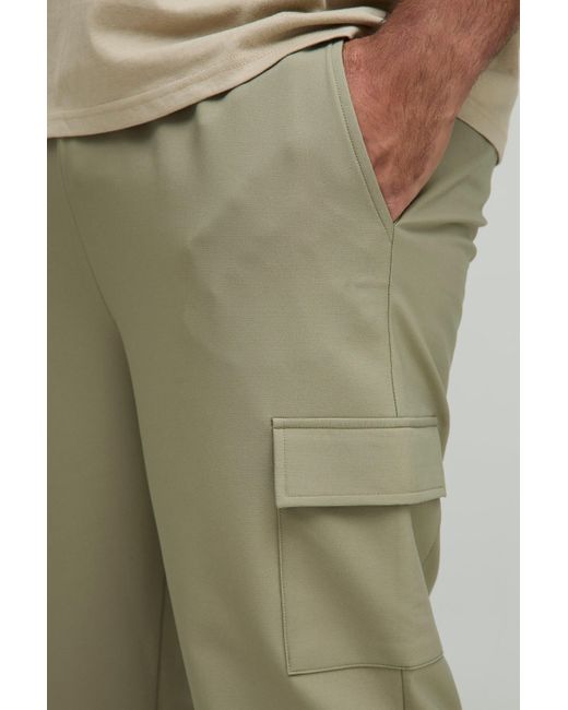 BoohooMAN Plus Skinny Stretch Cargo-Hose mit elastischem Bund in Green für Herren