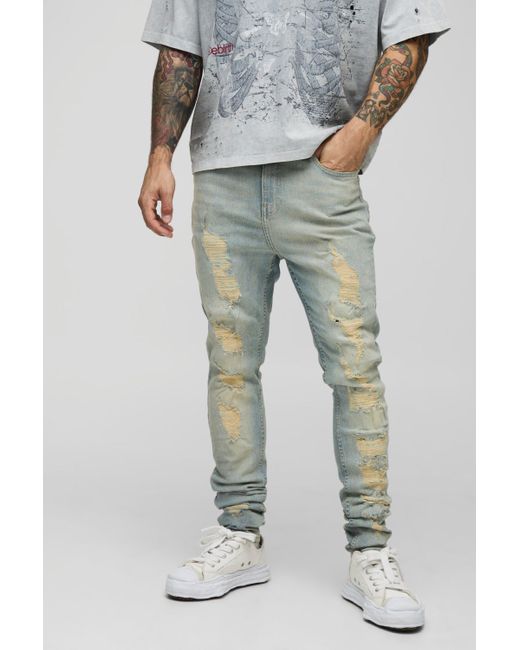 BoohooMAN Gray Skinny Stretch Washed Stacked Ripped Jeans for men