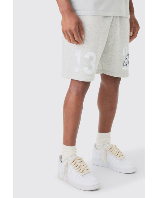 BoohooMAN White Relaxed Mid Length Ofcl Racing Marl Shorts for men