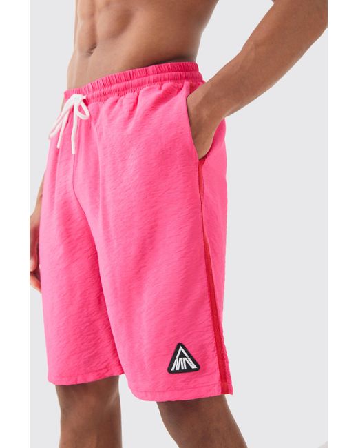 BoohooMAN Pink Triangle Crinkle Board Trunks for men