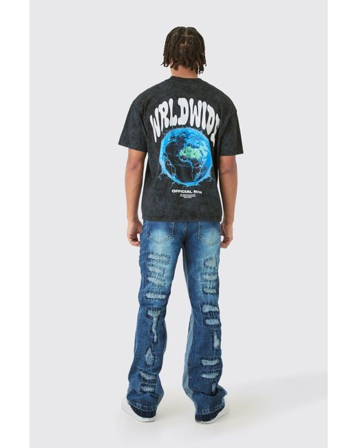 BoohooMAN Blue Slim Flare Rigid All Over Rip & Repaired Jeans In Indigo for men