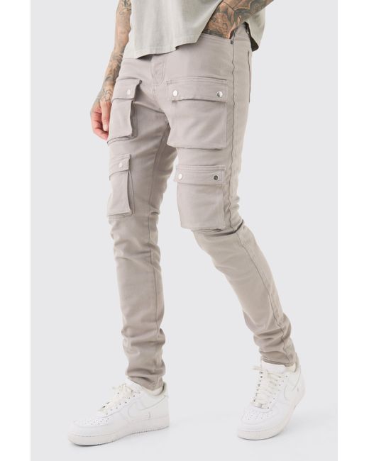 BoohooMAN Tall Fixed Waist Skinny Multi Cargo Pocket Trouser in Natural für Herren