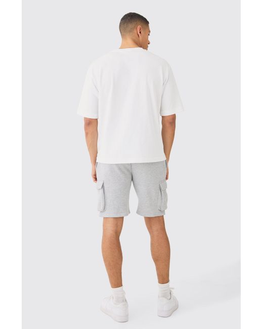 BoohooMAN White Man Signature Loose Fit Mid Length Cargo Short for men
