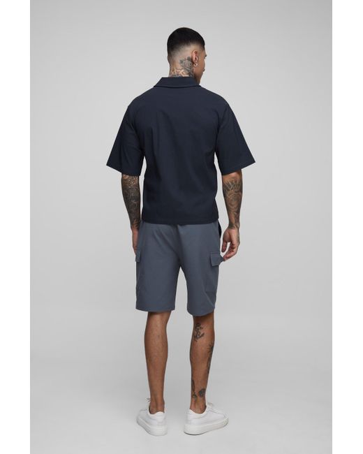 BoohooMAN Blue Tall Relaxed Fit Technical Stretch Cargo Shorts for men