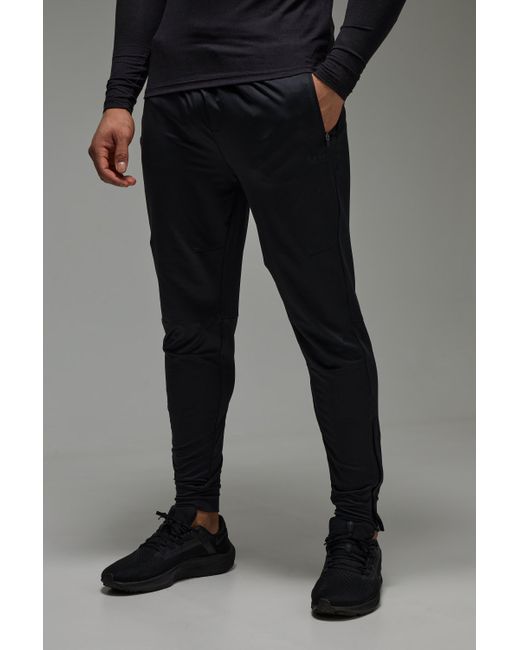BoohooMAN Black Active Stretch Zip Hem Tapered Sweatpants for men