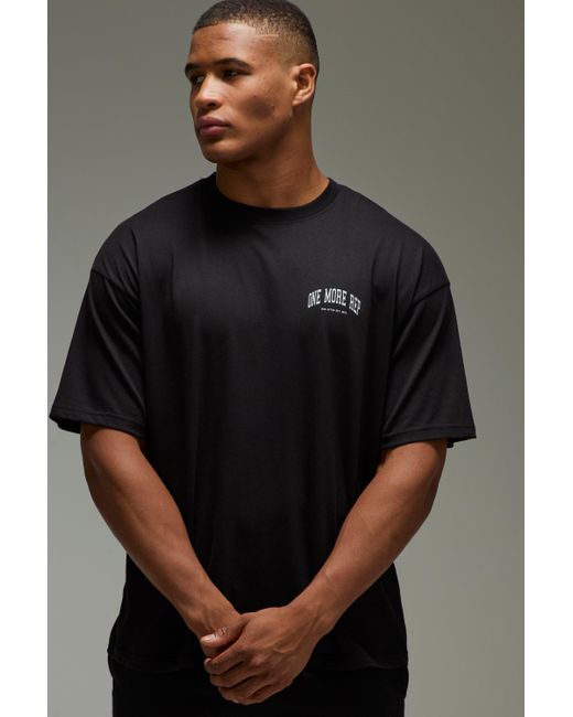 Camiseta Man Active Oversize Con Estampado One More Rep Boohoo de color Black