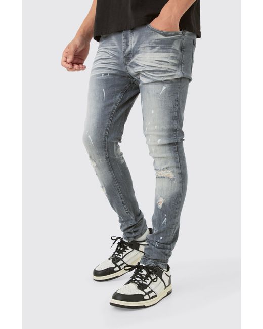 Super Skinny Stretch Ripped Jean In Dirty Wash Boohoo de color Blue