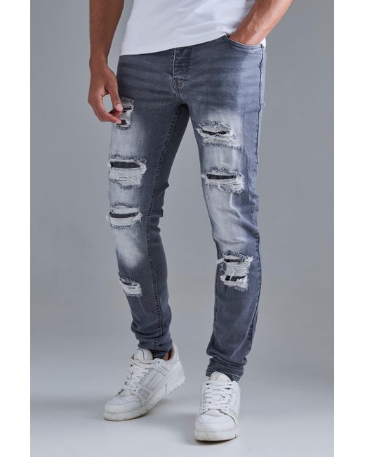 Boohoo Blue Skinny Stacked Distressed Ripped Jeans In Grey