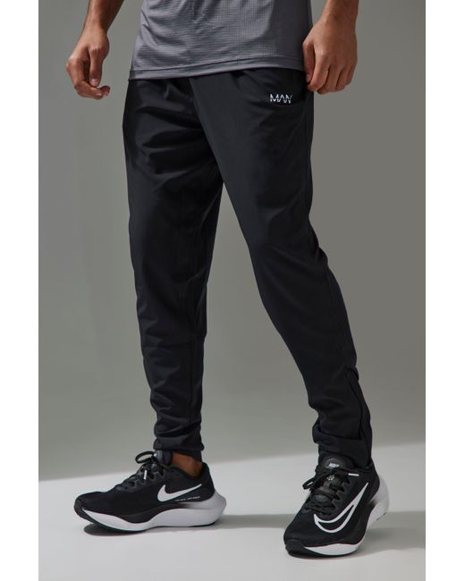 BoohooMAN Black Active Performance Lightweight Stretch Woven Tapered Sweatpants for men