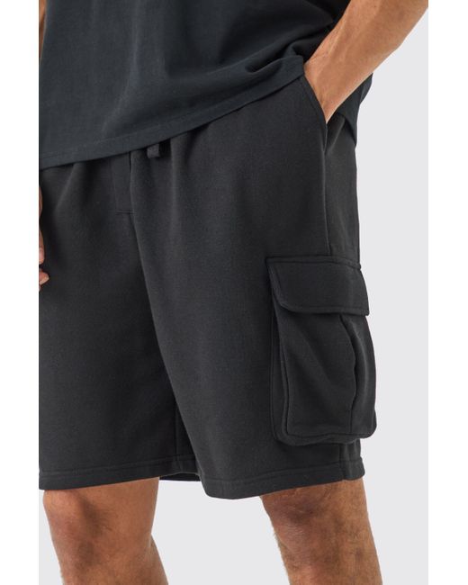 BoohooMAN Black Oversized Drop Crotch Cargo Pocket Jersey Shorts for men
