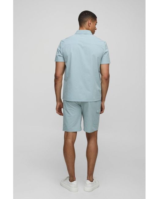 Conjunto Regular De Pantalón Corto Cómodo Y Camisa Técnica Elástica Boohoo de color Blue
