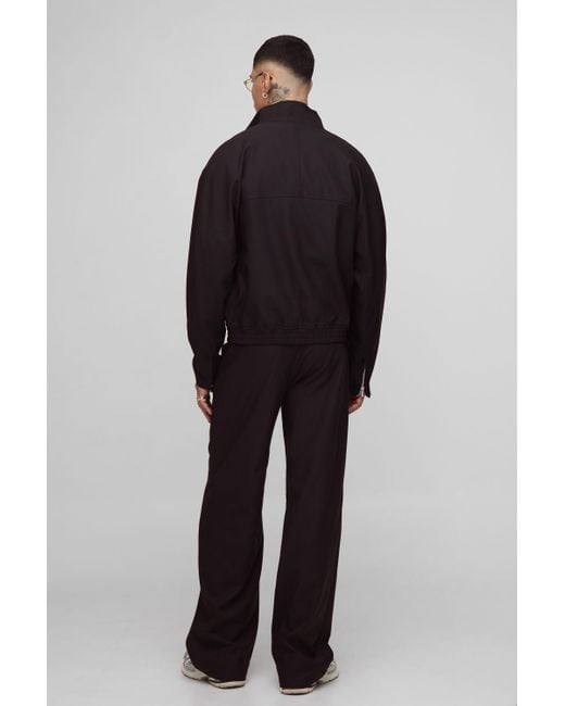 BoohooMAN Tall bestickte Trainingsjacke mit Trichterkragen in Black für Herren