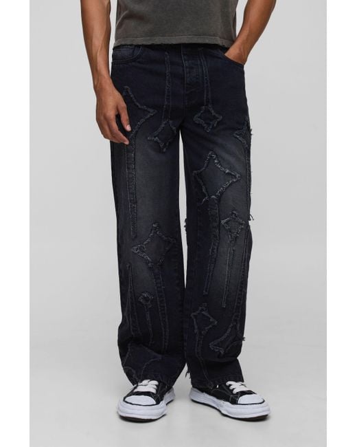 BoohooMAN Men's Black Relaxed Fit Star Applique Washed Jeans