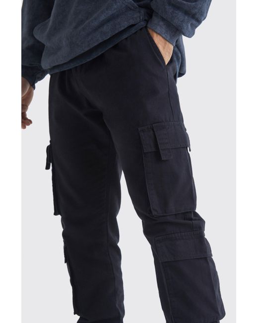 BoohooMAN Slim-Fit Jogginghose mit Cargo-Taschen und elastischem Bund in Blue für Herren
