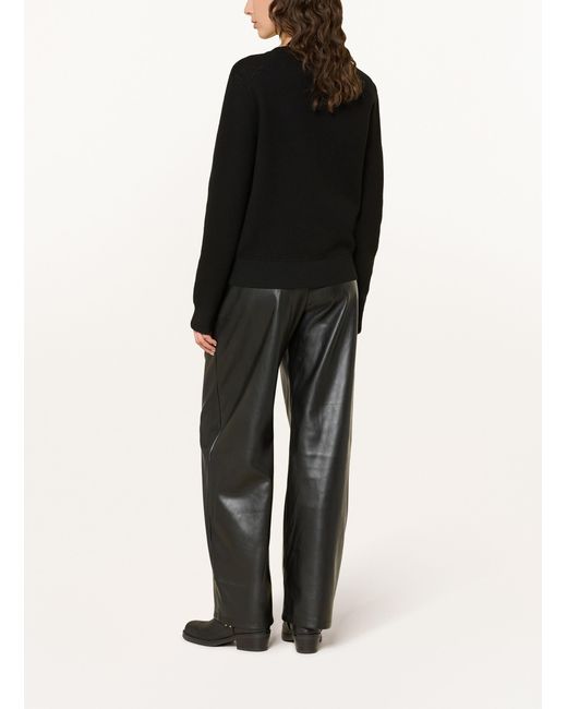 MCM Black Pullover mit Glitzergarn