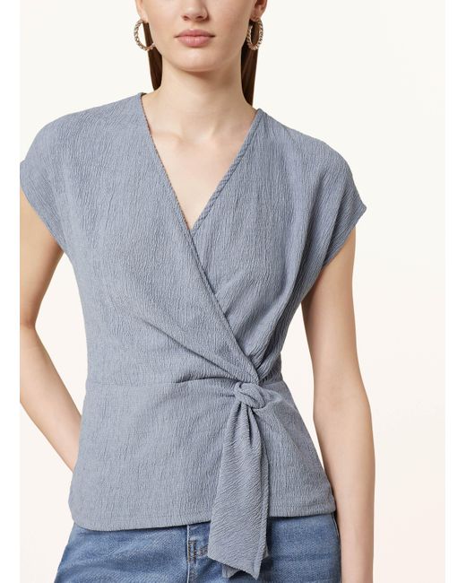 Cartoon Blue Bluse in Wickeloptik