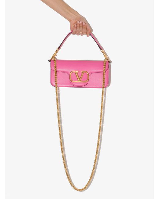 Valentino Garavani Vlogo Baguette Leather Shoulder Bag in Pink - Lyst