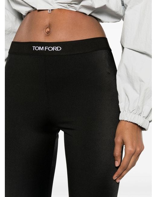 https://cdna.lystit.com/520/650/n/photos/brownsfashion/55b9f67a/tom-ford-Black-Logo-Waist-leggings-Womens-Polyamideelastane.jpeg