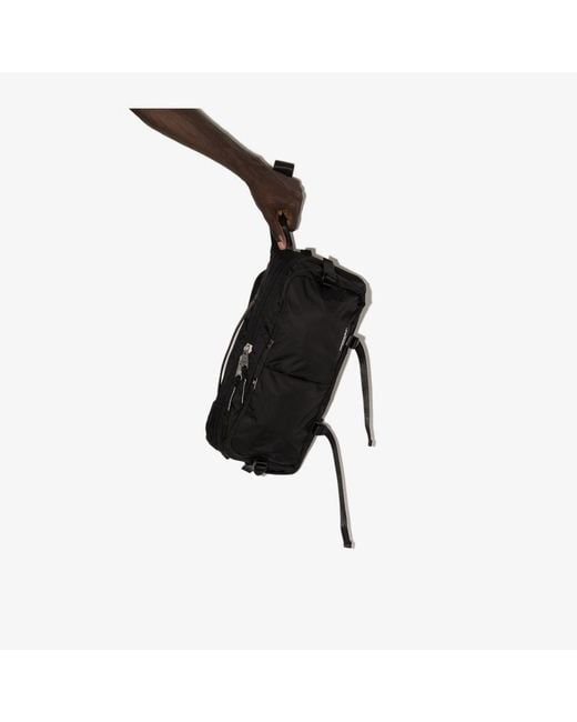 Indispensable Black Snug Econyl Sling Backpack for men