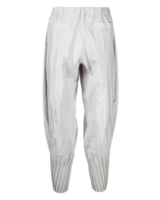 Homme Plissé Issey Miyake White Pleated Tapered Trousers for men