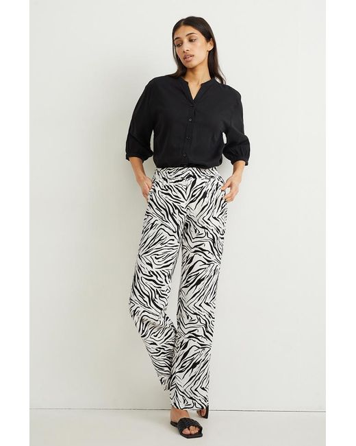 Pantalón de lino-mid waist-regular fit-estampado C&A de color Blanco | Lyst