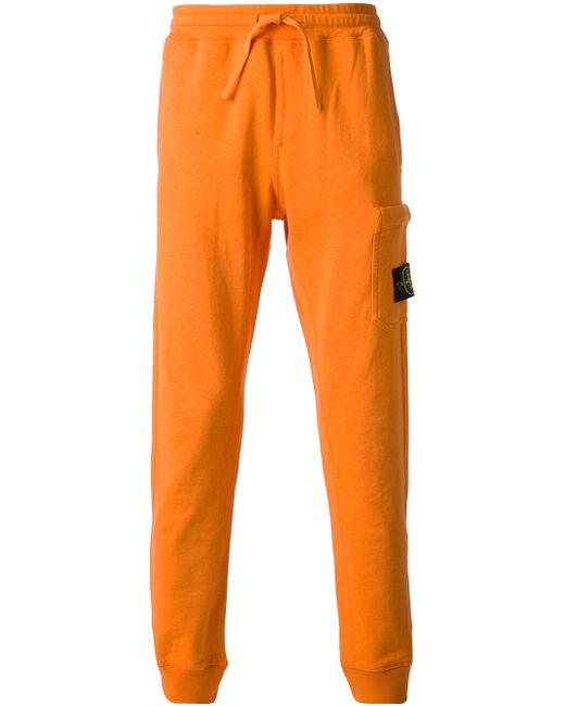Stone Island Orange Track Pants for men