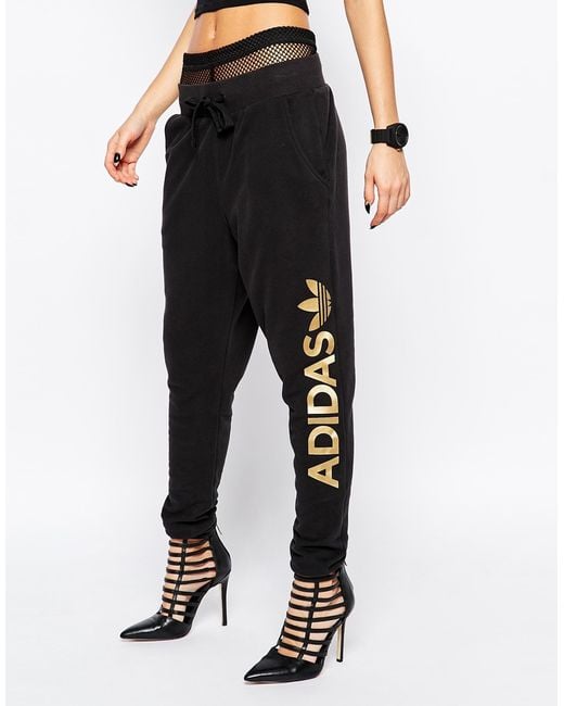 Adidas Black Originals Sweat Pants With Gold Side Logo