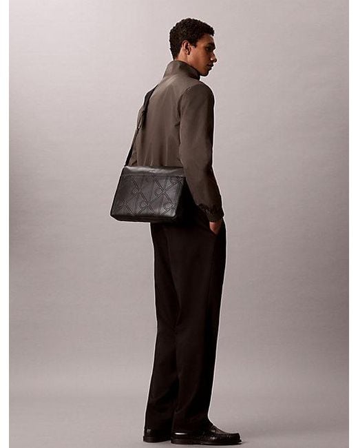 Calvin Klein Black Embossed Emblem Logo Laptop Bag for men