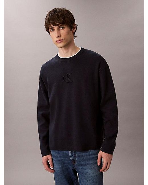 Calvin Klein Black Jeans Embossed Monogram Logo Relaxed Jumper for men