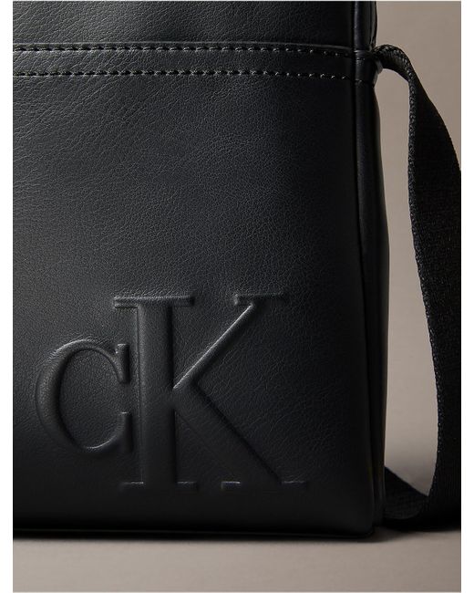 Calvin Klein Black Embossed Monogram Logo Reporter Bag for men