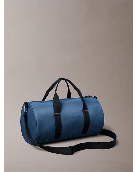 Calvin Klein Blue Monogram Logo Duffle Bag for men
