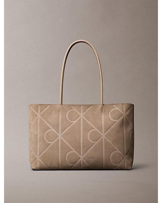 Calvin Klein Natural Embossed Emblem Logo Sueded Tote Bag
