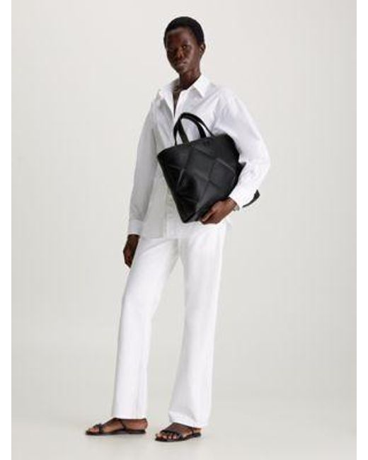 Bolso tote acolchado Calvin Klein de color Black