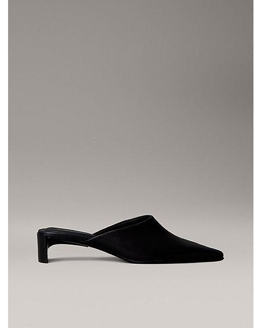 Mules de piel con tacón kitten Calvin Klein de color Gray