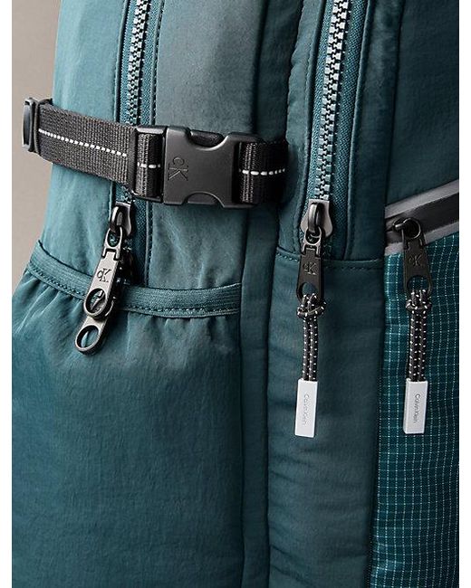 Calvin Klein Blue Striped Utility Zip Round Backpack for men
