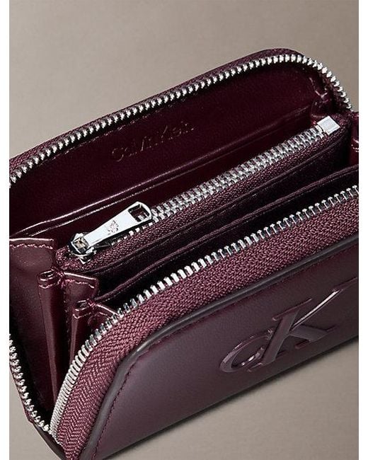 Calvin Klein Brown Embossed Monogram Zip Wallet