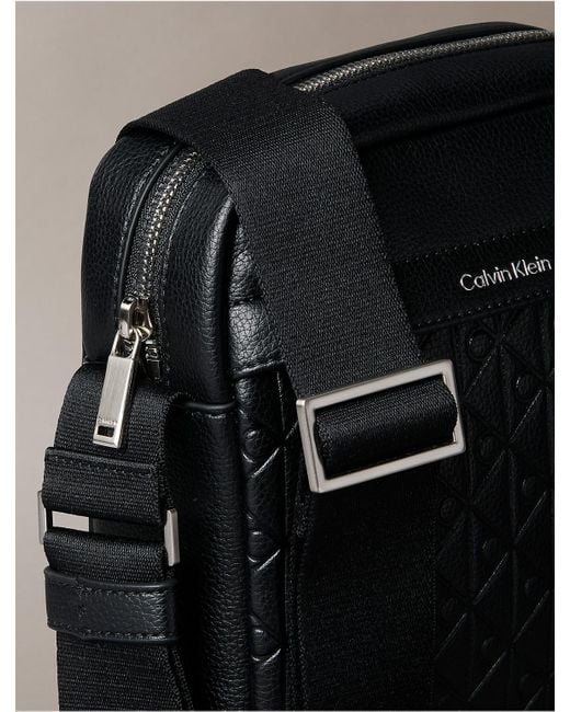 Calvin Klein Black Embossed Allover Monogram Reporter Bag for men