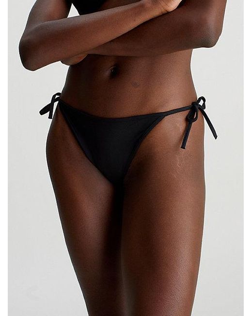 Partes de abajo de bikini con lazada - CK Meta Legacy Calvin Klein de color Brown